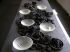 EL ALMA DEL VACÍO – ESCALFETES,  2006Vidrio    Pâte de Verre     12 piezas de 20 cm diametro x 8 cmInstalación con carbón y hierro. Foto: Pilar Aldana-Méndez